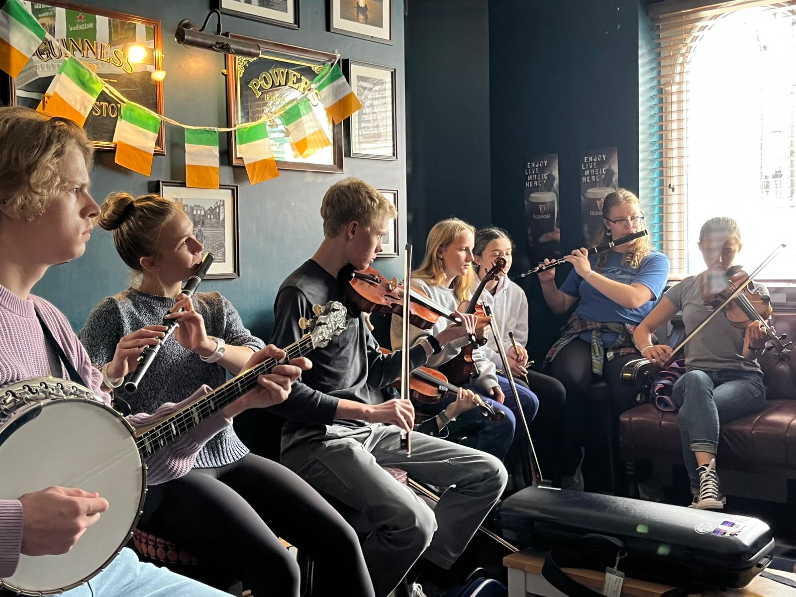 The magic of the “fleadh experience” was at the sessions, rehearsals, late-night card games, Scoil Éigse workshops, concerts, riverside walks, and copious cups of Irish tea (and coffee). This was the inaugural session of Minnesota folks at Kerrigans.