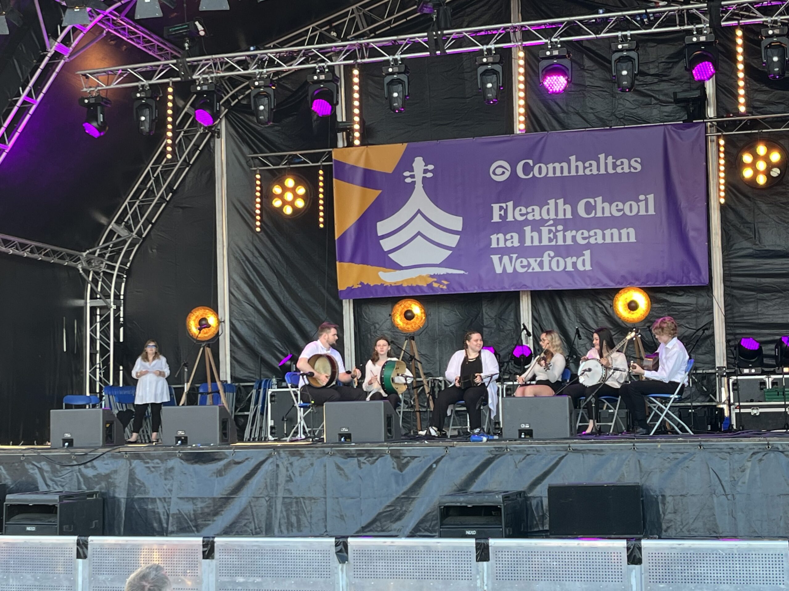 Morien McBurnie (far right) on stage with musicians from Chicago’s Murphy Roche School of Irish Music.